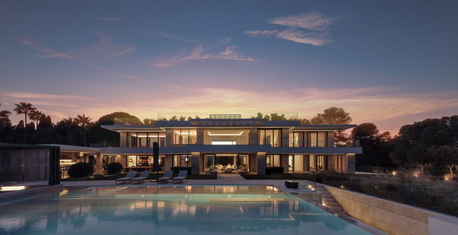 Evening perspective of a contemporary villa with an infinity pool and warm interior lighting in Marbella.