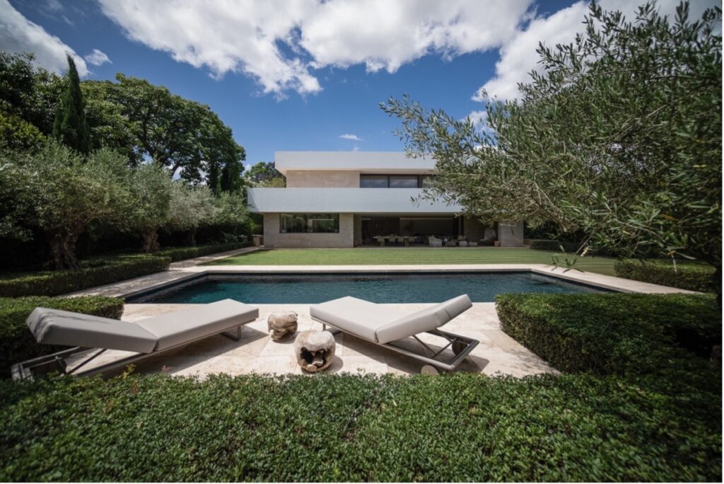 Exterior view of Villa Vida by ARK Architects, a sustainable luxury residence integrated into the landscape of Sotogrande Costa.