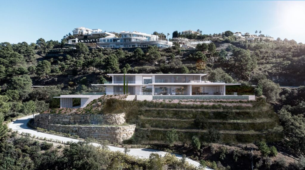 Modern architectural facade in La Zagaleta featuring natural stone and organic materials by Manuel Ruiz Moriche.