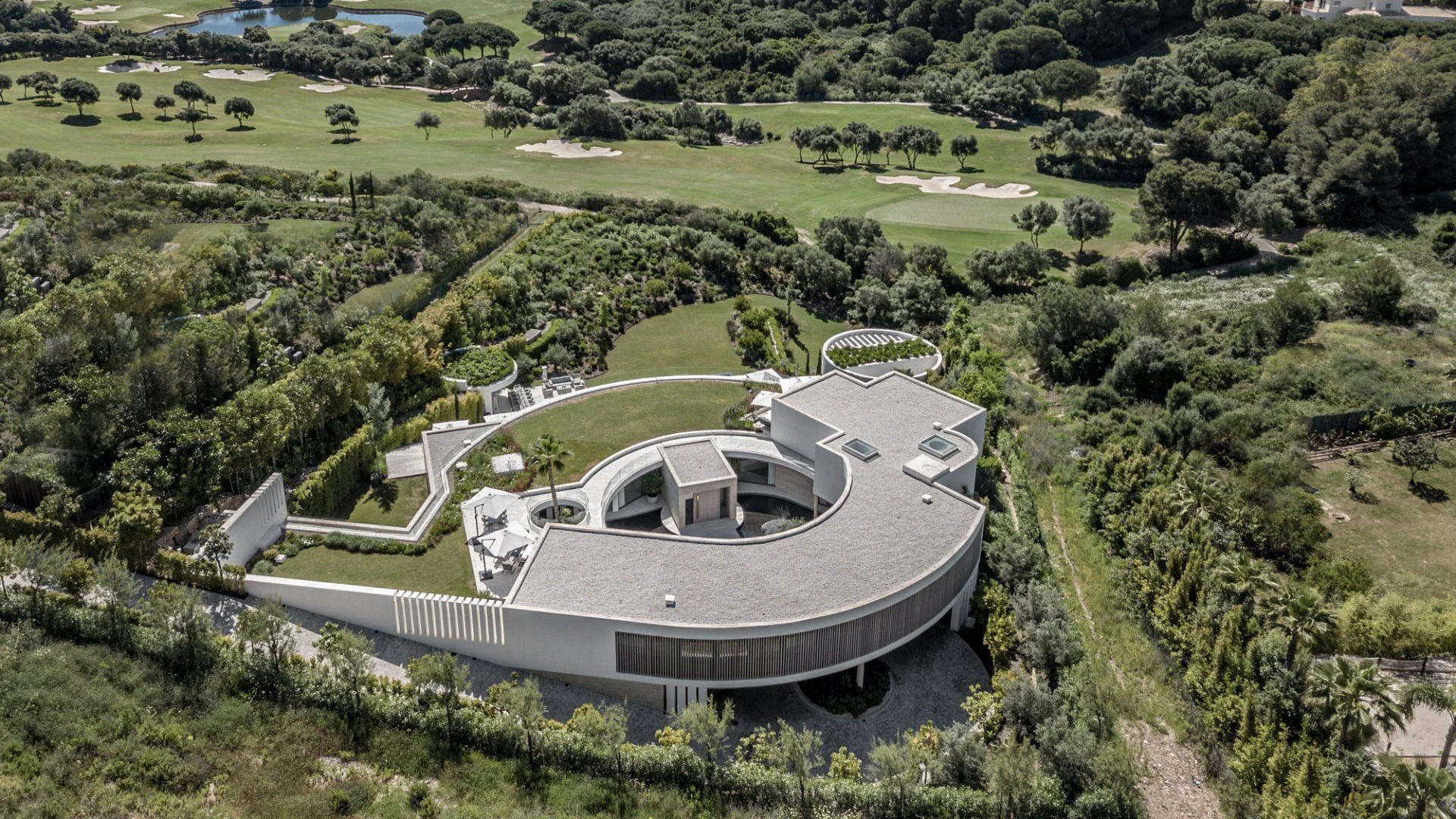 Aerial view of Villa VELA, an architectural masterpiece by Manuel Ruiz Moriche in El Mirador de la Reserva.
