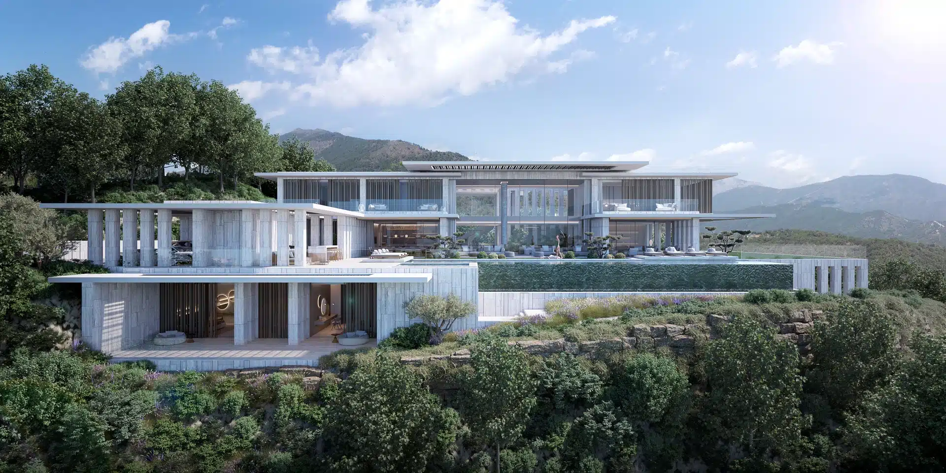 Modern luxury villa with geometric white volumes and integrated Mediterranean landscaping in Benahavís.