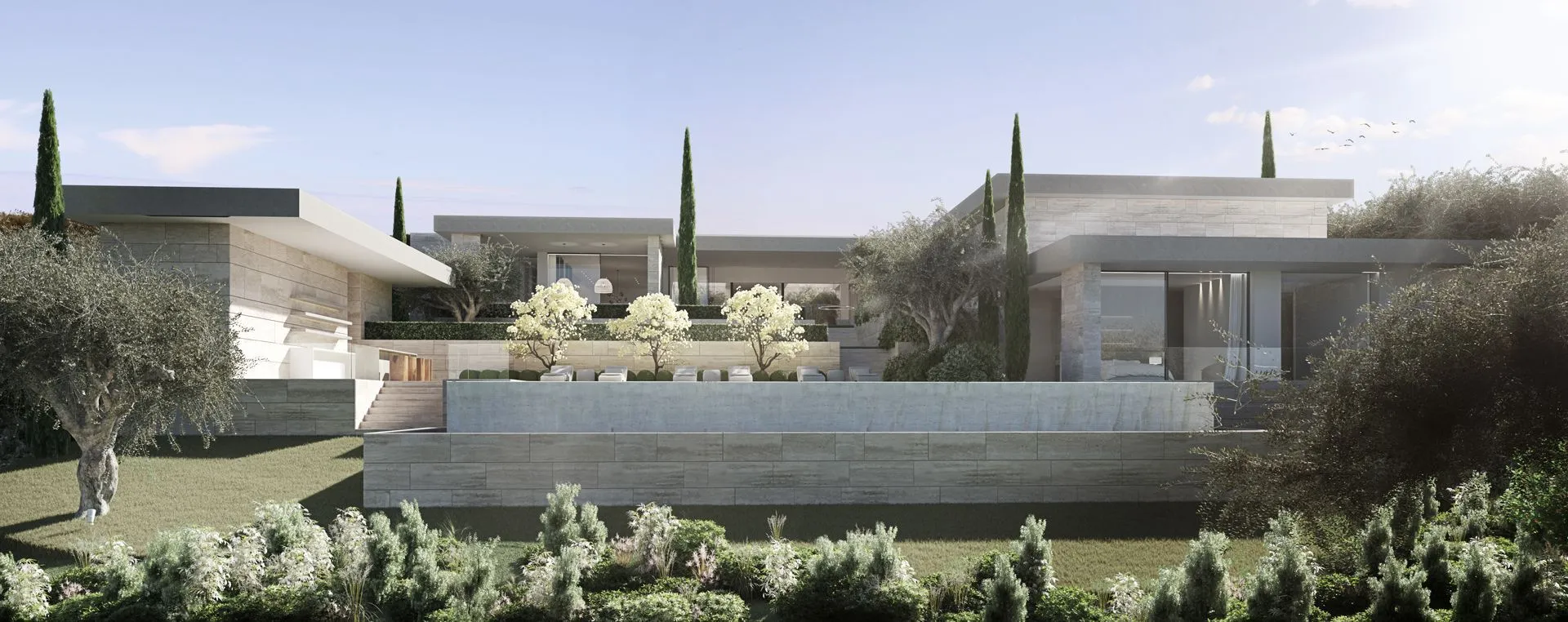 Stunning pool deck area integrated into the natural environment of Valderrama, emphasizing peace and architectural symmetry.