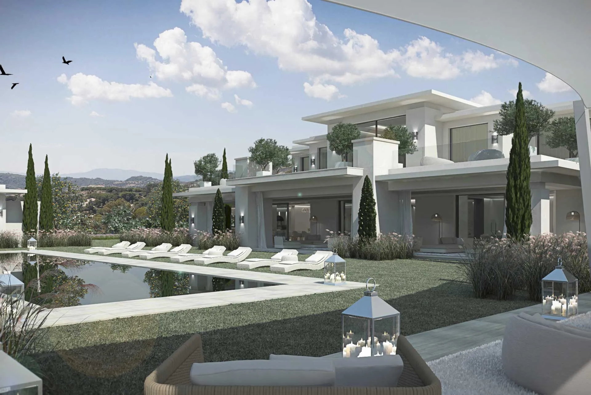 Luxury villa terrace with a seamless infinity pool overlooking the Mediterranean landscape.