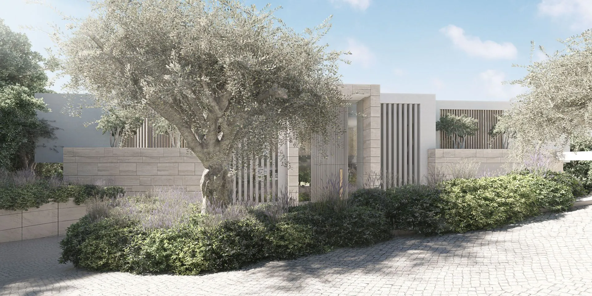 Sustainable architectural facade surrounded by native vegetation and curated landscaping.