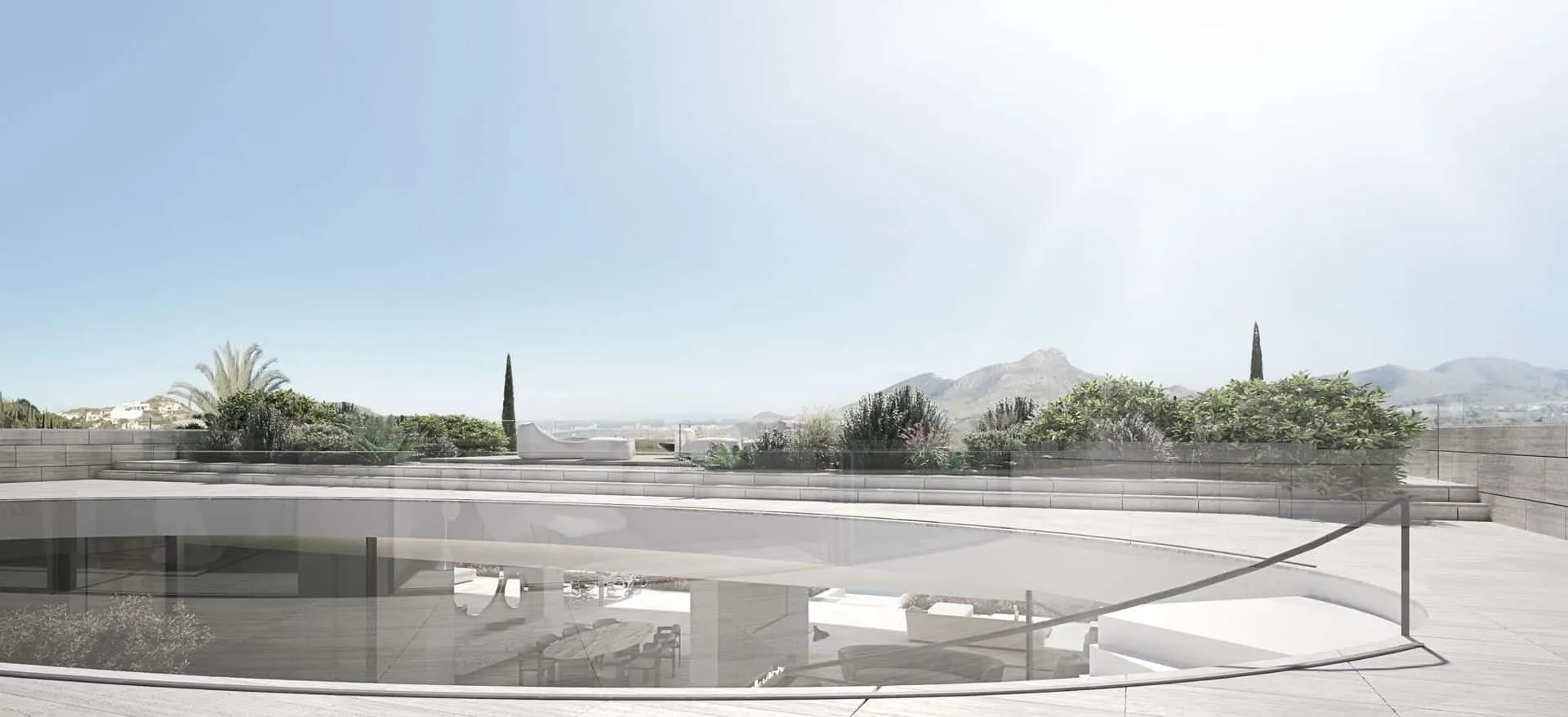 Innovative circular courtyard opening on a stone terrace with panoramic mountain views and minimalist landscaping.