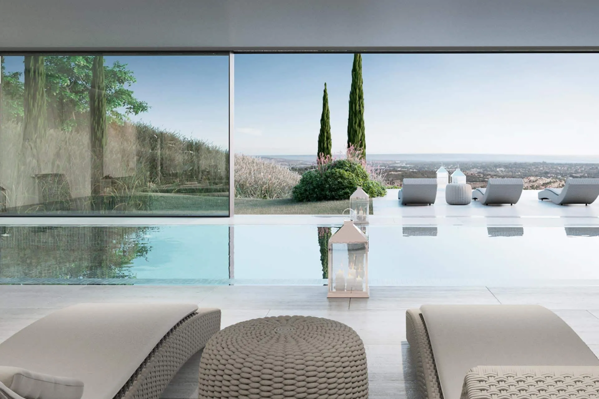 Elegant interior lounge with natural materials, floor-to-ceiling windows, and abundant natural light.