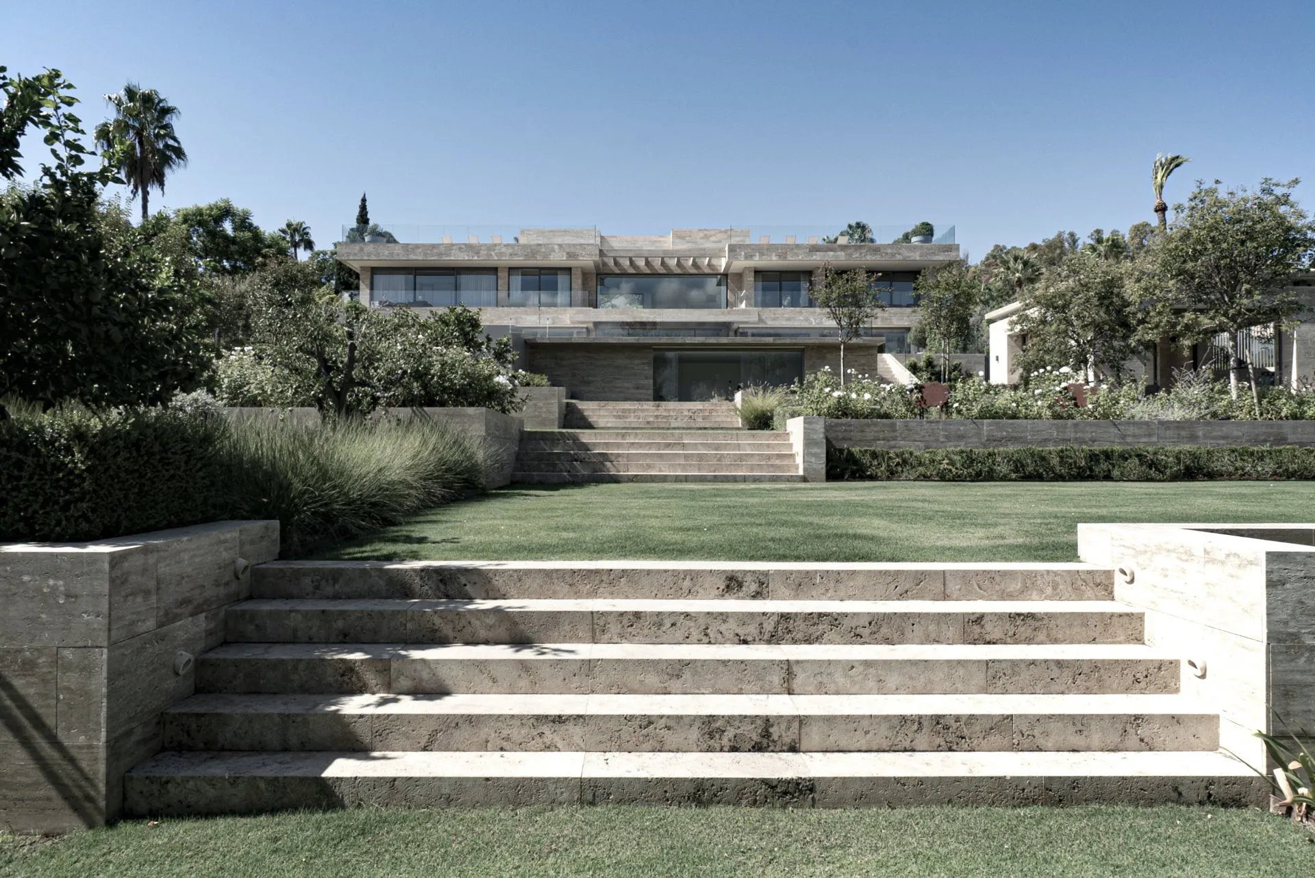 ARK Architects master plan featuring stone steps integrated into a lush Mediterranean garden.