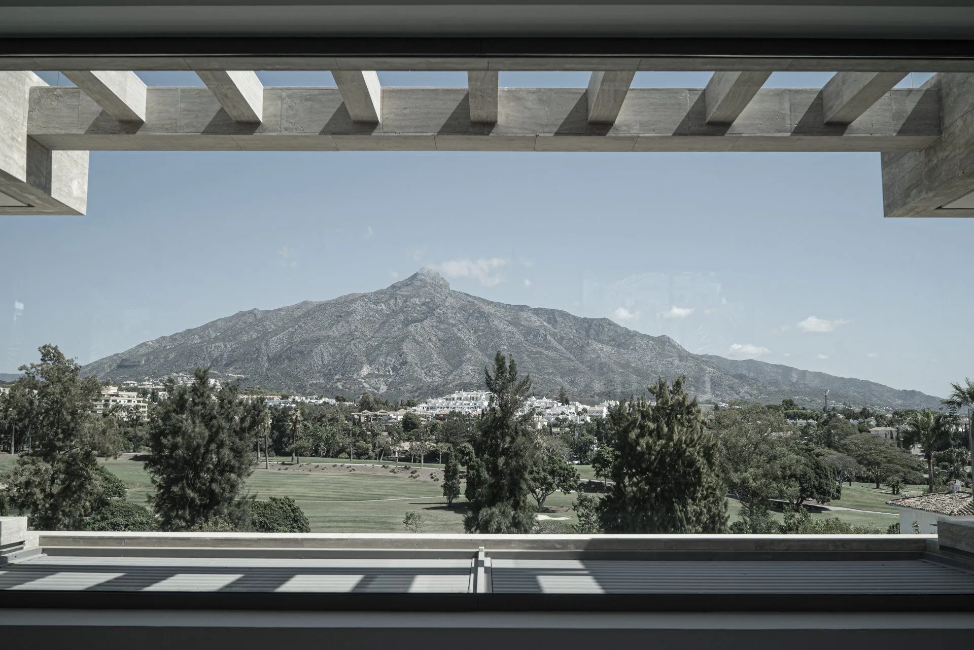 Designed by Manuel Ruiz Moriche, this residence features bold geometric lines integrated with the Marbella landscape.
