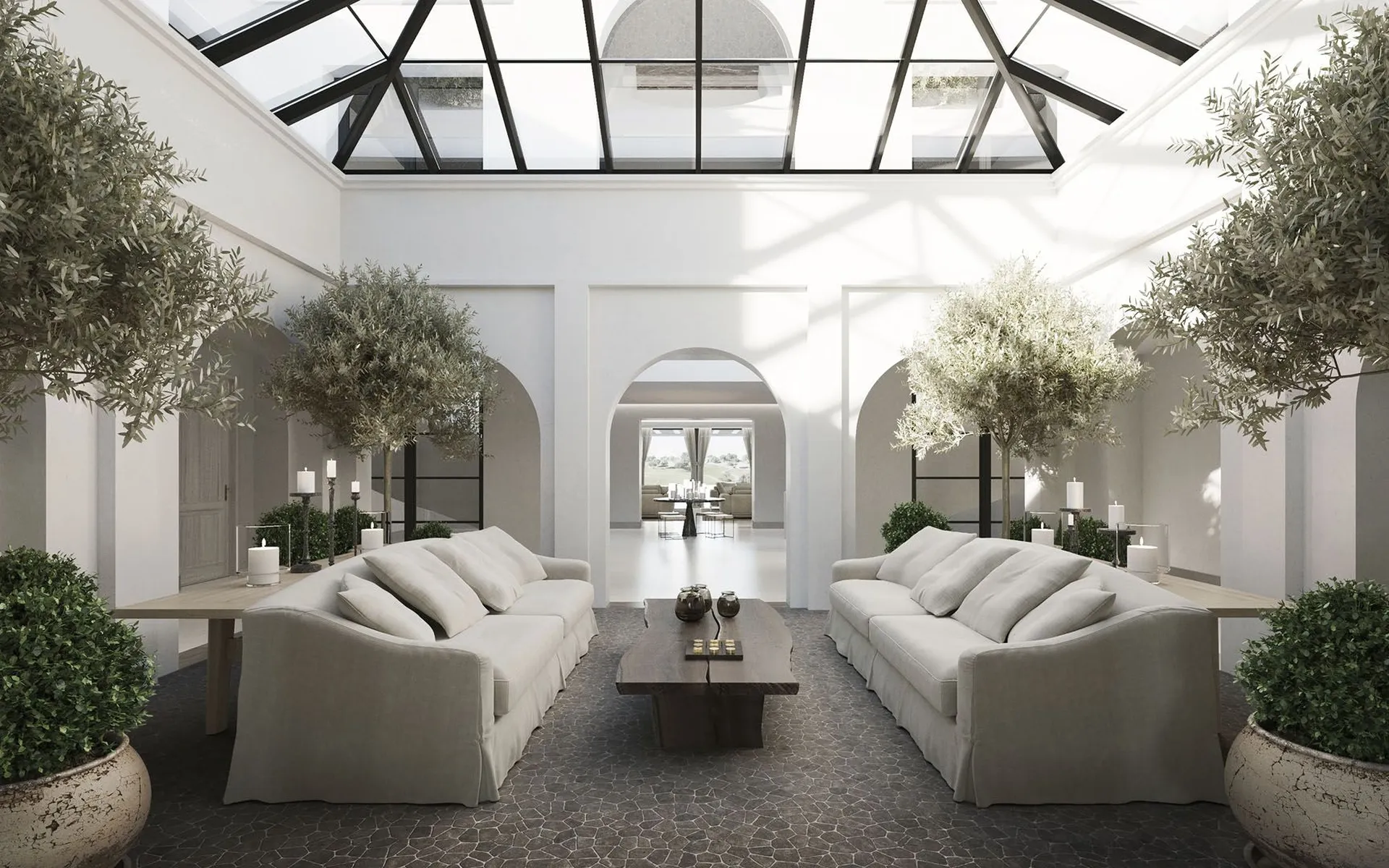 Modern double-height living room featuring floor-to-ceiling windows and premium neutral-toned finishes.