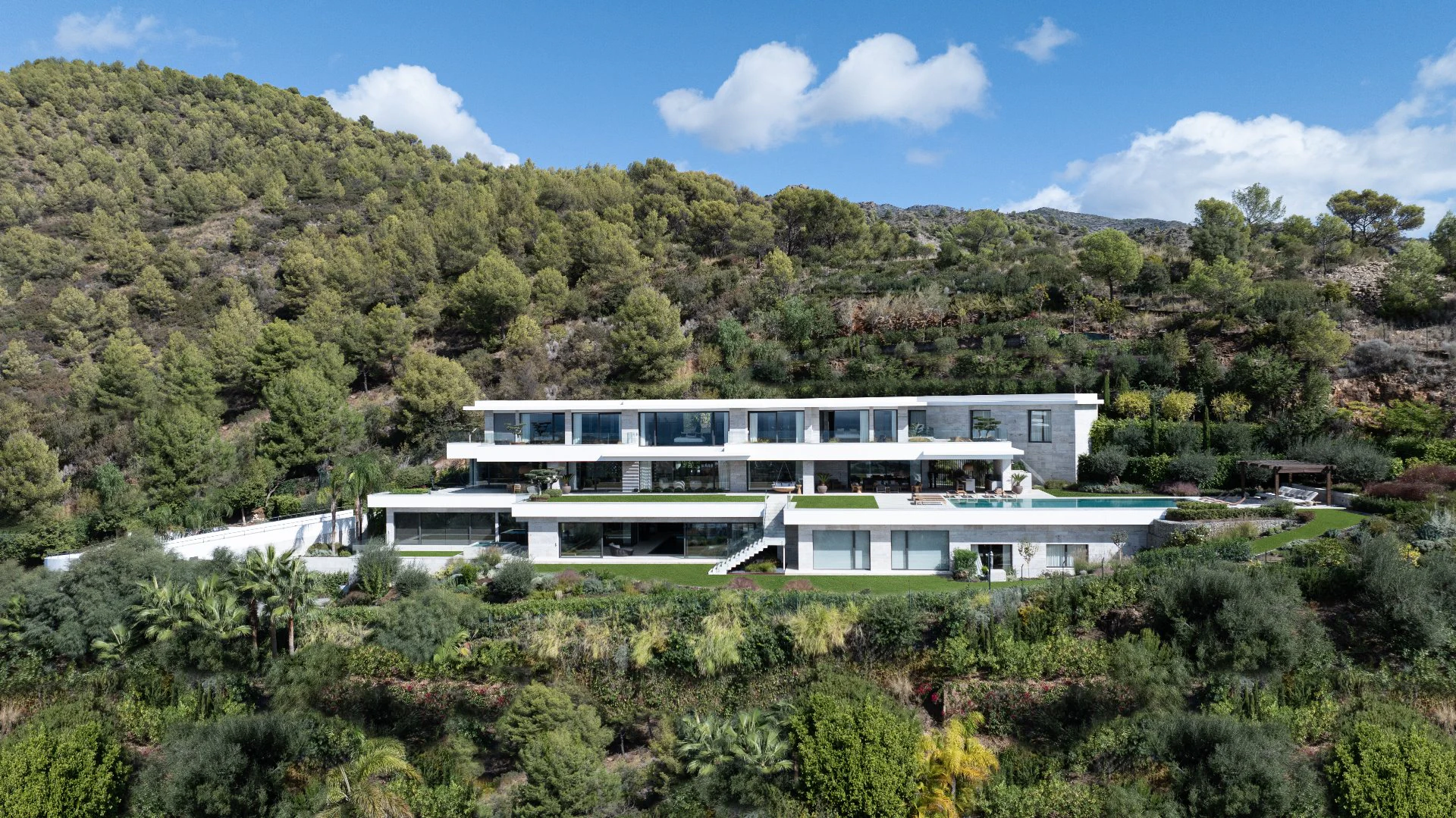 Bespoke hillside villa in Marbella perfectly integrated into the natural landscape.