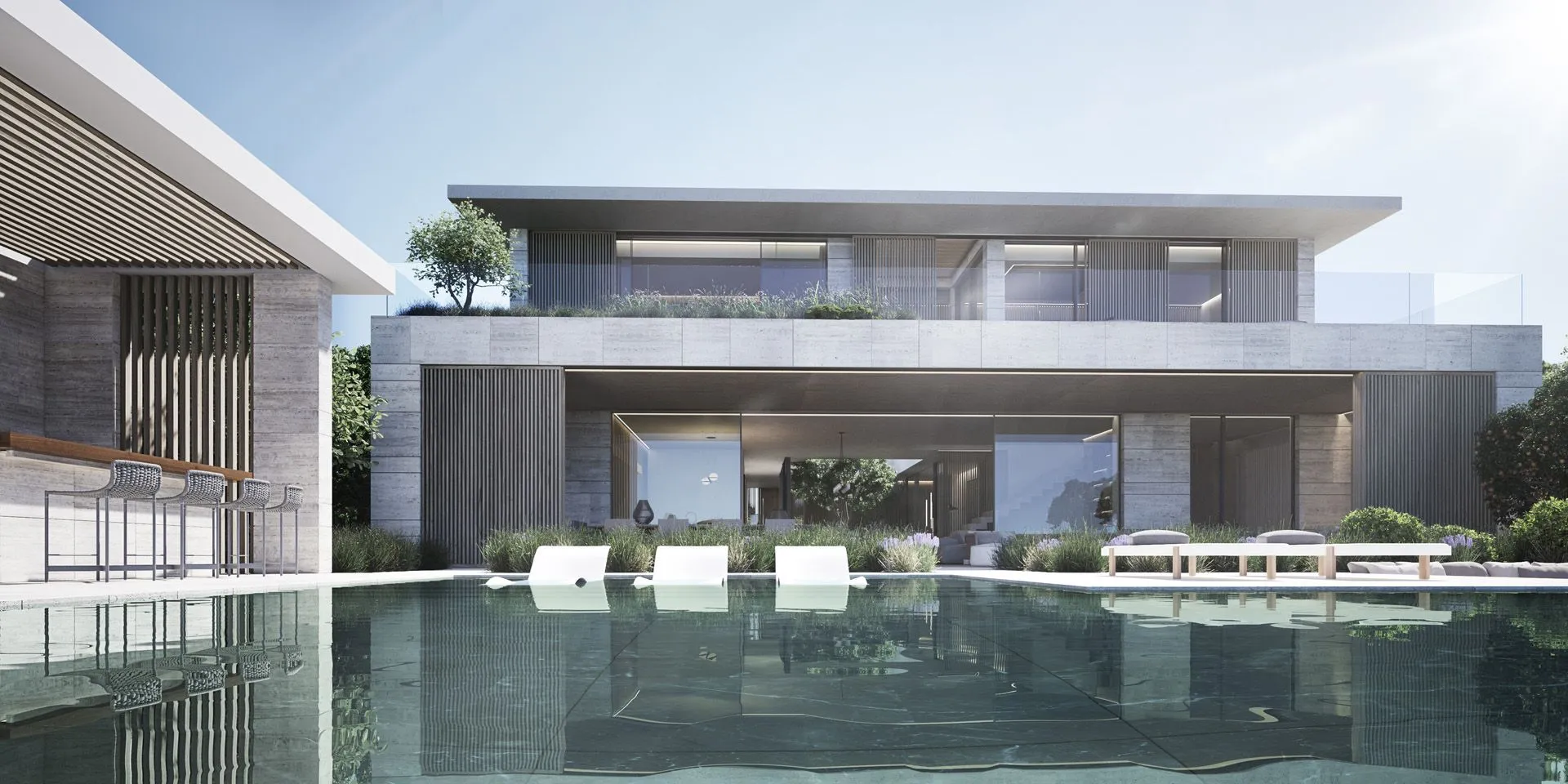 Stunning infinity pool reflecting the clean white lines of a contemporary luxury residence.