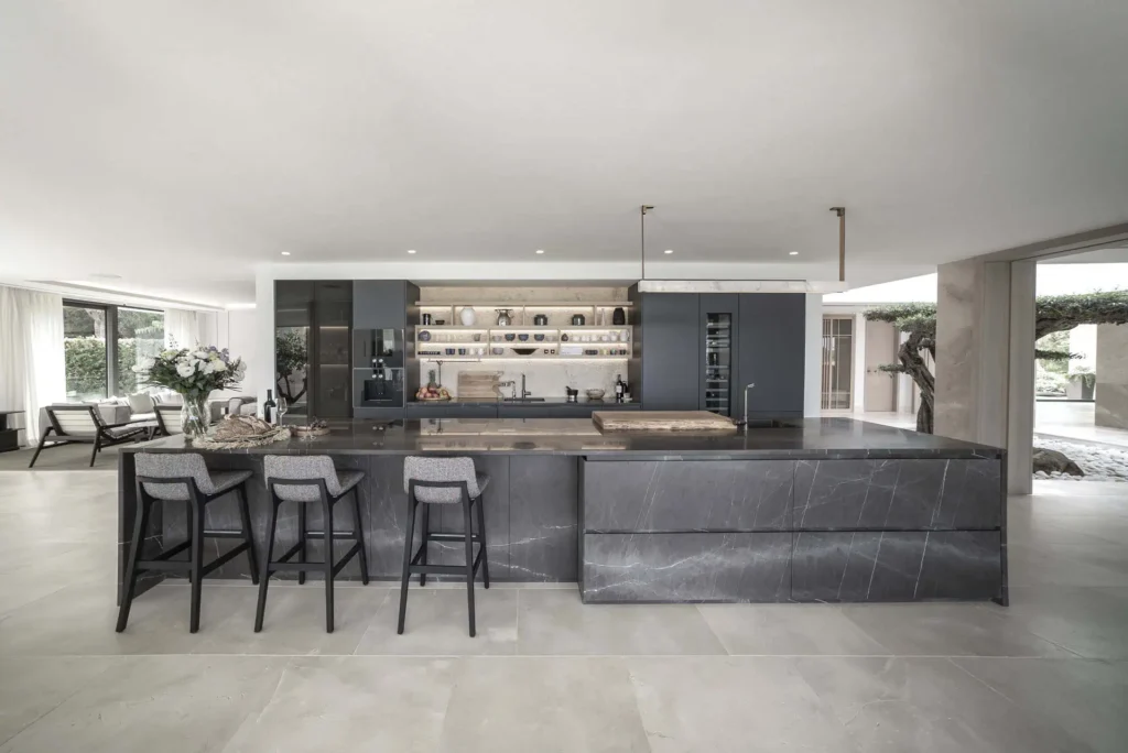 the hill spacious ARK Architects kitchen integrated with the living space, reflecting the kitchen as the heart of the home and a place to share experiences