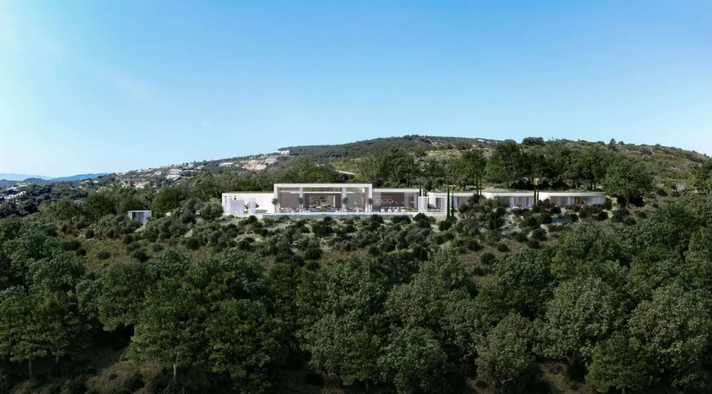 Modern sustainable villa design featuring clean lines and seamless integration with the lush Mediterranean landscape in Sotogrande