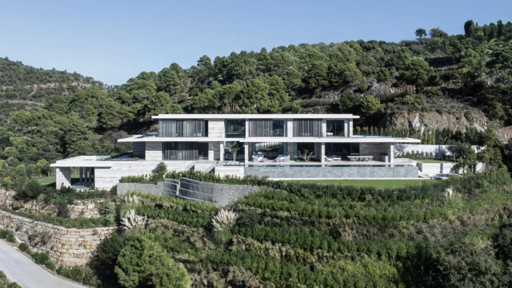 Main entrance view of Villa Geneve by Manuel Ruiz Moriche, reflecting modern quiet luxury aesthetic.