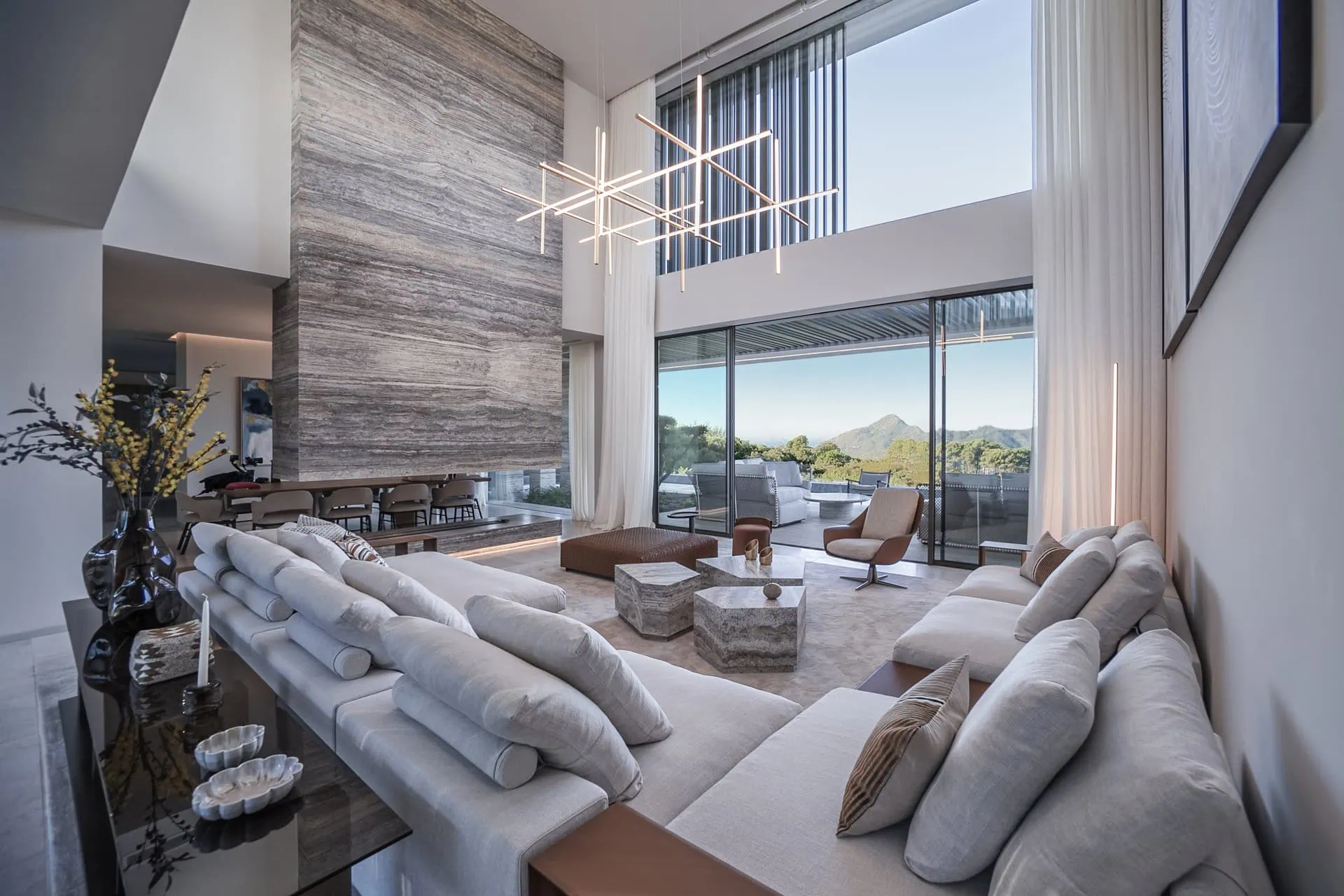 Villa Geneve living room by ARK Architects in La Zagaleta: bio-architecture interior with natural light and sea views, AD Mexico.