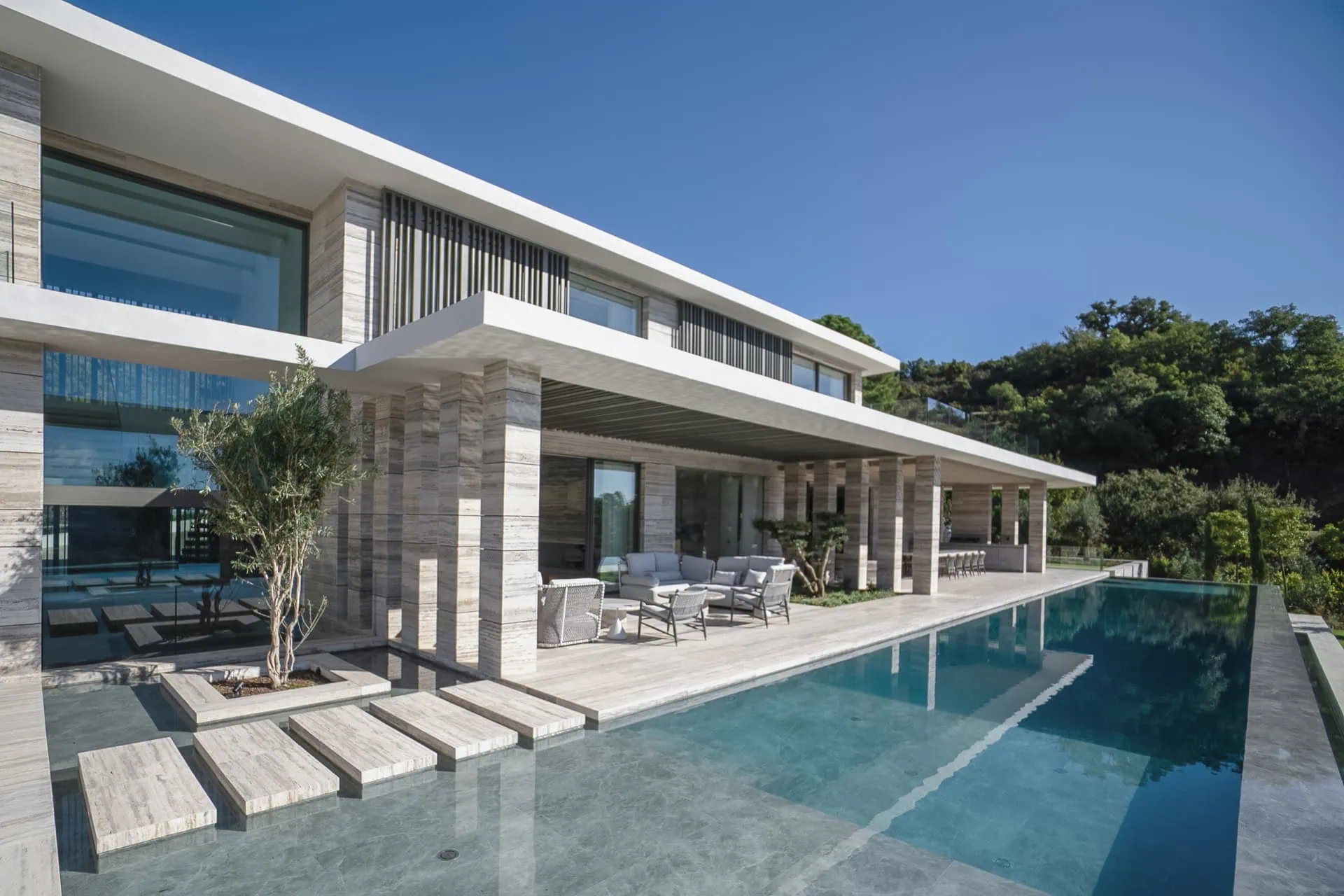 Villa Geneve by ARK Architects: infinity pool terrace in La Zagaleta, Costa del Sol - luxury bio-architecture design.